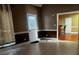 A modern living room with neutral walls, trim, and flooring at 4197 Trotters Way Dr, Snellville, GA 30039