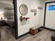 Stylish entryway with a mirror, decor, and access to the bedroom at 1074 Hobson Sw St, Atlanta, GA 30310