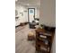 Well-lit entryway with stylish decor and a glimpse of the living room at 1074 Hobson Sw St, Atlanta, GA 30310