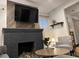 Living room featuring a modern fireplace and decorative accents at 1074 Hobson Sw St, Atlanta, GA 30310