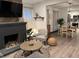 Open-concept living room showcasing the fireplace and adjacent dining area at 1074 Hobson Sw St, Atlanta, GA 30310
