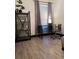 Home office featuring a modern desk, comfortable chair, and stylish shelving unit at 1074 Hobson Sw St, Atlanta, GA 30310