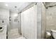 Modern bathroom with tiled shower, neutral walls, modern fixtures and decorative accents create a relaxing space at 5452 Tally Green Dr, Marietta, GA 30068