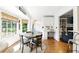 Inviting breakfast nook featuring a round table, large windows, and a built-in desk for added functionality at 5452 Tally Green Dr, Marietta, GA 30068