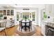 Bright kitchen nook with a breakfast table, bay windows, and natural light, perfect for morning meals at 5452 Tally Green Dr, Marietta, GA 30068