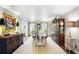 Spacious dining room featuring neutral colors, traditional furniture, and backyard view at 5452 Tally Green Dr, Marietta, GA 30068