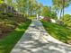 Long driveway leading to a home with mature trees, offering a sense of privacy and seclusion at 5452 Tally Green Dr, Marietta, GA 30068