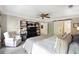 Cozy bedroom featuring a sliding barn door, a ceiling fan and neutral decor at 5452 Tally Green Dr, Marietta, GA 30068
