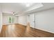 Lovely bedroom features a trey ceiling, hardwood floors, and walk-out access to a private balcony at 5705 Twelve Oaks Dr, Cumming, GA 30028