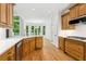 Kitchen with stainless steel appliances and hardwood floors at 5705 Twelve Oaks Dr, Cumming, GA 30028