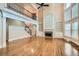 Open living area showcases a fireplace, built-ins, and a second-floor balcony for a modern design at 9843 Talisman Dr, Alpharetta, GA 30022