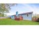 Spacious backyard featuring a charming wooden deck, providing an ideal outdoor living space at 1181 Mannbrook Dr, Stone Mountain, GA 30083