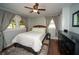 Cozy bedroom with a comfortable bed, soft lighting and soothing color palette at 1907 Shalimar Ne Dr, Atlanta, GA 30345