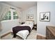 Cozy bedroom showcasing a full-sized bed and neutral decor at 1907 Shalimar Ne Dr, Atlanta, GA 30345