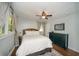 Cozy bedroom features hardwood floors, light-filled windows, and a modern ceiling fan at 1907 Shalimar Ne Dr, Atlanta, GA 30345