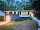 Charming home featuring painted brick, manicured landscaping, and an inviting entrance at 1907 Shalimar Ne Dr, Atlanta, GA 30345