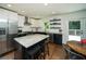 Updated kitchen with stainless steel appliances, granite countertops, and a central island with seating at 1907 Shalimar Ne Dr, Atlanta, GA 30345