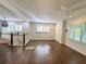Open-concept living space with hardwood floors, white walls, and plenty of natural light at 1907 Shalimar Ne Dr, Atlanta, GA 30345