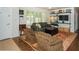 Inviting living room with a large window, comfortable seating, and stylish decor at 1907 Shalimar Ne Dr, Atlanta, GA 30345