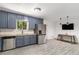 Updated kitchen featuring modern appliances, stylish cabinets, butcher block countertops, and a dining area at 240 Wellington Dr, Mcdonough, GA 30252