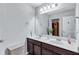 Bathroom features a double sink vanity, mirror, and neutral decor at 3259 Baylor Cir, Mcdonough, GA 30253