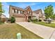 Charming home with a well-kept lawn, complemented by a long driveway and mature landscaping at 3259 Baylor Cir, Mcdonough, GA 30253
