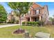 Beautiful home with a lush green lawn and mature landscaping, creating a welcoming and picturesque setting at 3259 Baylor Cir, Mcdonough, GA 30253