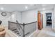 Hallway boasts stairway access, wood-look flooring, and a sauna at 3259 Baylor Cir, Mcdonough, GA 30253