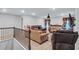 Cozy living room featuring plush seating, soft lighting and a comfortable atmosphere at 3259 Baylor Cir, Mcdonough, GA 30253