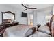 Main bedroom features a ceiling fan, bed, and a TV mounted on the wall at 3259 Baylor Cir, Mcdonough, GA 30253