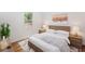 Inviting bedroom with a modern platform bed, soft lighting, and stylish decor at 3406 Jackson Dr, Decatur, GA 30032