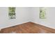 This bright bedroom has hardwood floors, fresh paint and natural light from two windows at 3406 Jackson Dr, Decatur, GA 30032