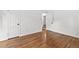 Bright bedroom features hardwood floors, white trim and fresh paint, with a closet at 3406 Jackson Dr, Decatur, GA 30032
