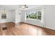 Bright living room featuring hardwood floors, large windows, and ample natural light at 3406 Jackson Dr, Decatur, GA 30032