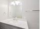 Updated bathroom vanity with granite countertop, ample lighting, and updated fixtures at 429 Landers Dr, Mableton, GA 30126