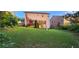 Spacious backyard view with a deck and lush green lawn, perfect for outdoor enjoyment at 570 Eldridge Dr, Suwanee, GA 30024