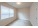 Bedroom featuring neutral walls, carpet and window that lets in natural light at 570 Eldridge Dr, Suwanee, GA 30024