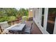 Outdoor deck featuring an outdoor dining area with chairs, perfect for enjoying meals outside at 570 Eldridge Dr, Suwanee, GA 30024