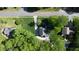 Aerial view of house, driveway and landscaping on a sunny day at 619 Stoney Creek Rd, Woodstock, GA 30188