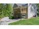 Gray two-story home with garage, covered deck, and driveway at 619 Stoney Creek Rd, Woodstock, GA 30188