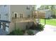 This home has a two-story deck with staircase and garage at 619 Stoney Creek Rd, Woodstock, GA 30188