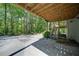 View under deck showing support beams and a staircase at 619 Stoney Creek Rd, Woodstock, GA 30188