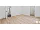 Spacious bedroom with hardwood floors and an ensuite bathroom at 1749 Patriots Nw Way, Kennesaw, GA 30152