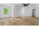 Bonus Room featuring hardwood floors, a ceiling fan, and a window with natural light at 1749 Patriots Nw Way, Kennesaw, GA 30152