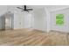 Bonus Room featuring hardwood floors, a ceiling fan, and a window with natural light at 1749 Patriots Nw Way, Kennesaw, GA 30152