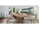 Elegant dining room with hardwood floors, seating for six, and open access to gourmet kitchen at 1749 Patriots Nw Way, Kennesaw, GA 30152