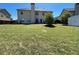 Spacious backyard featuring a large grassy area at 2030 Hydrangea Ln, Austell, GA 30106