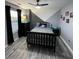 bedroom with a decorative wall and neutral-toned furnishings at 2030 Hydrangea Ln, Austell, GA 30106