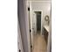 Hallway view leading to a bathroom featuring a shower/tub combination at 2030 Hydrangea Ln, Austell, GA 30106