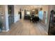 Open-concept kitchen with gray cabinetry, stainless steel appliances, and a breakfast bar at 2030 Hydrangea Ln, Austell, GA 30106